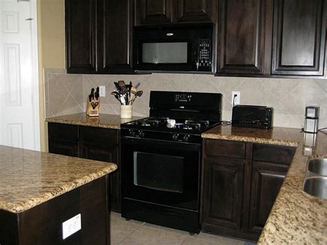 Chocolate Kitchen Cabinets With Stainless Steel Appliances Anipinan