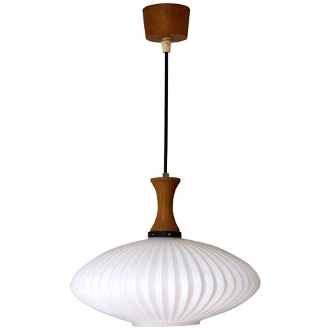 Three pendant fixture with white glass shades and a walnut frame #danish #fixtures #light #modern #pendants #retro. Mid-Century Danish Glass and Wood Chandelier or Pendant ...