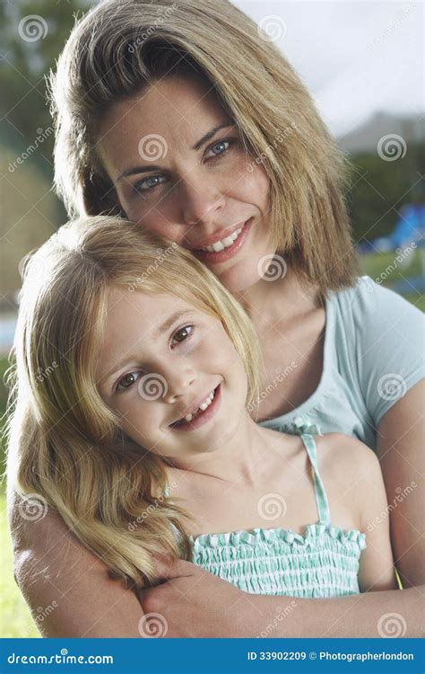 Closeup Of Mother Hugging Daughter Outdoors Stock Image Image Of