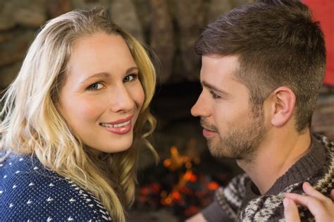 Premium Photo Close Up Of A Romantic Couple In Front Of Fireplace