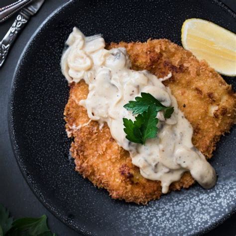 Check spelling or type a new query. Super crispy and golden-brown Pork Schnitzel with a creamy ...