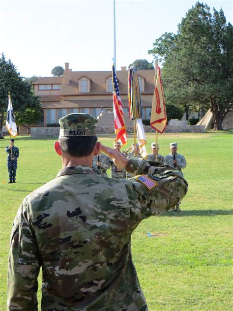 Col Wright Salutes During His Ceremony To Take Command Of