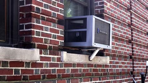 How to install a window air conditioner in your apartment. Why window AC units are in New York but not the rest of ...