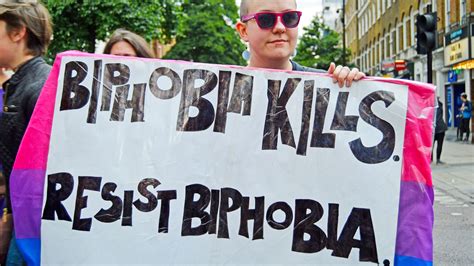 Person Holding Sign That Says Biphobia Kills Resist Bisexuals At Pride 2560x1440 Download