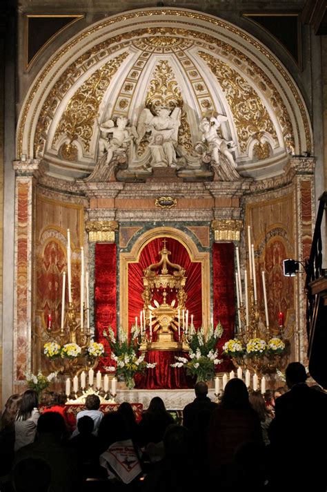 Roman catholic church with etched glass windows and baroque ornament in a gothic style. Altars of Repose set up in various churches of Rome. After ...