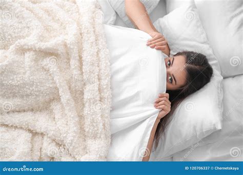 Young Beautiful Woman Hiding Under Blanket In Bed Stock Image Image