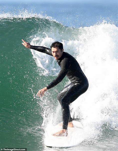 Henry Golding Masters The Ocean Waves While Surfing Before Making His