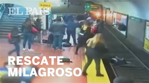 los usuarios del metro de buenos aires salvan a una mujer que había caído a las vías youtube