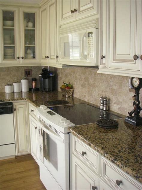 White cabinetry is a classic choice for a kitchen. 273 best images about Granite with white cabinets on ...