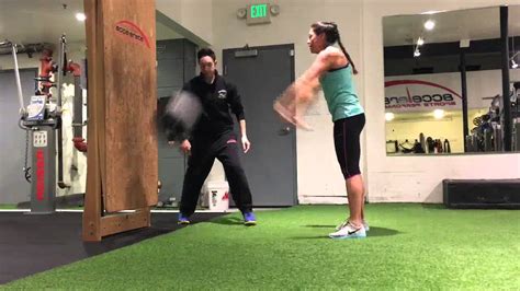 Parallel Stance Med Ball Overhead Catch And Slam At Wall Without