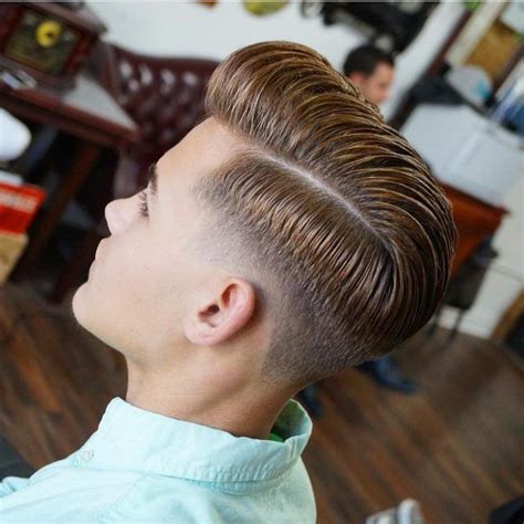 The low taper fade is stylish and easy to get, and continues to be the most popular fade haircut for guys. Parted Combover Low Tape-Up | Low fade haircut, Hairstyles ...