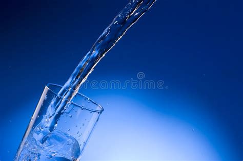 Water Stream Being Poured Into A Glass Stock Image Image Of High
