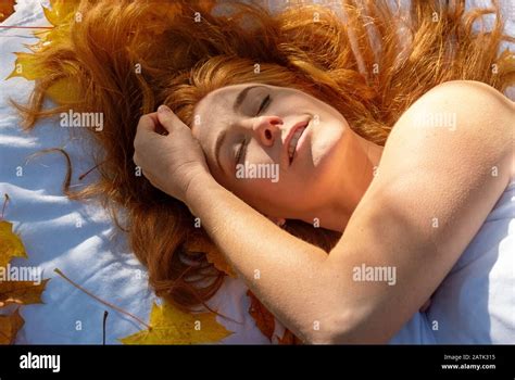 Sensual Portrait Of A Red Haired Woman Beautiful Sexy Outdoors In