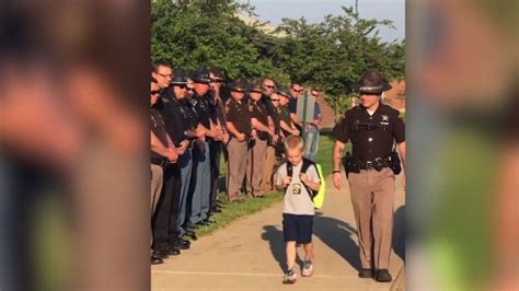 70 Cops Escorted A 5 Year Old To His First Day Back To Class After