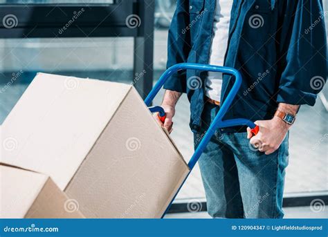 Close Up View Of Man Pushing Hand Truck Stock Image Image Of Working