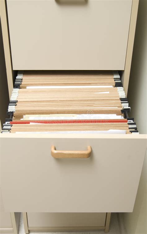 Letter or legal size hanging file folders. Filing Cabinet With Hanging Folders Stock Photo - Image of ...