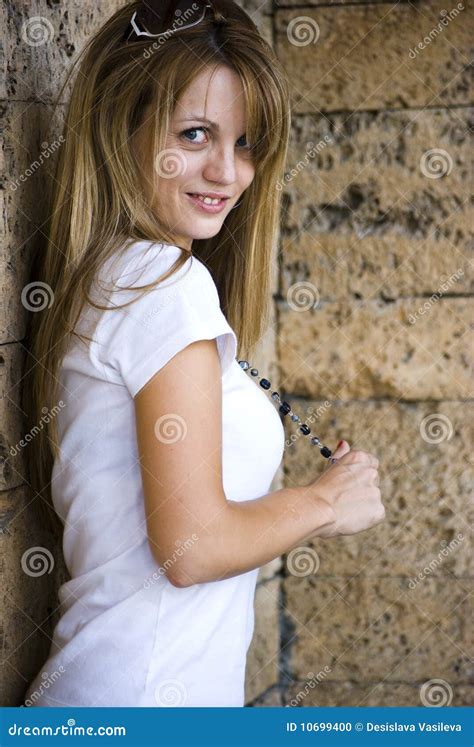 Pretty Young Woman Posing On Wall Stock Photo Image Of Model