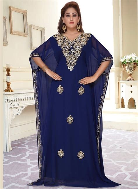 Expanding their collection to appeal to the modern bride with her eye on a light pink, blue or otherwise to help you find your perfect style, we rounded up our 19 favorite blue wedding dresses from real brides and the runway (and the designers!). Dark blue and gold kaftan dress for women moroccan caftan ...