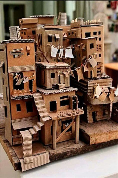 Mit der richtigen veredelung und nachbehandlung kann nicht einmal wasser diesen möbeln etwas anhaben. cardboard living | Karton kunst, Karton skulptur, Haus aus ...