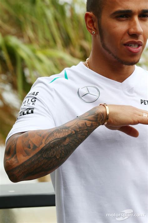 No need to register, buy now! Lewis Hamilton, Mercedes AMG F1 and his tattoos on his arm ...