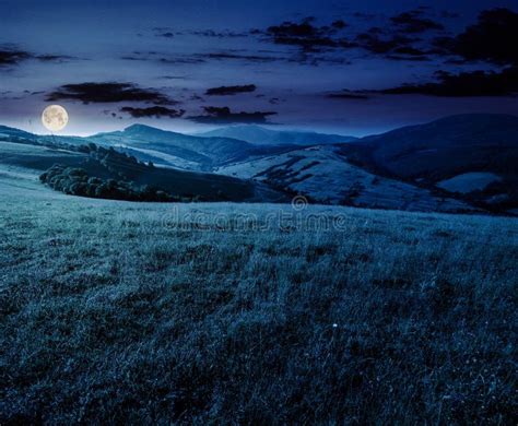 Grassy Meadow In Mountains At Night Stock Image Image Of Light