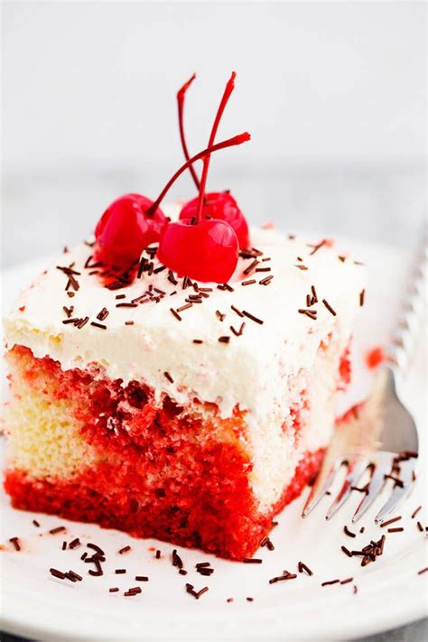 an easy and classic moist poke cake seeping with delicious cherry jello mixed with coke and