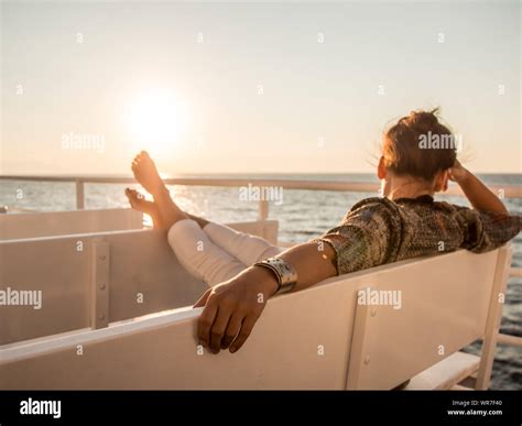 Cruise Ship Vacation Young Woman Enjoying Sunrise On Travel At Sea With