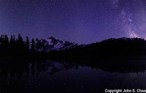 Milky Way Rises By Mount Shuksan With Stars Reflected In Picture Lake