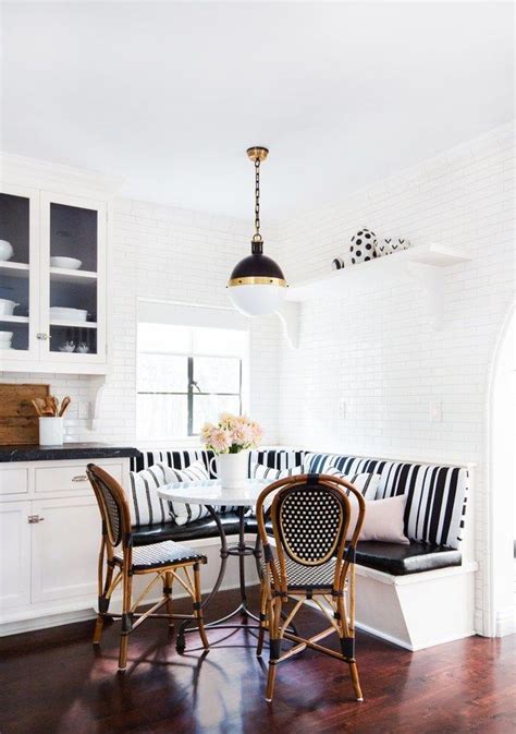 In The Breakfast Nook A Pendant From Circa Lighting Dangles Over A