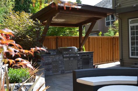 Make sure that you build your kitchen nearby the plumbing and electricity lines for a cheaper cost. Outdoor Kitchen - Traditional - Patio - portland - by All ...