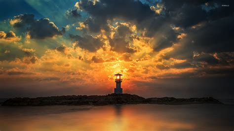 Sunset Sun Light Through The Tower Of The Lighthouse