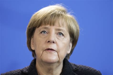 angela merkel on defensive over germany s refugee policy spy celebnest