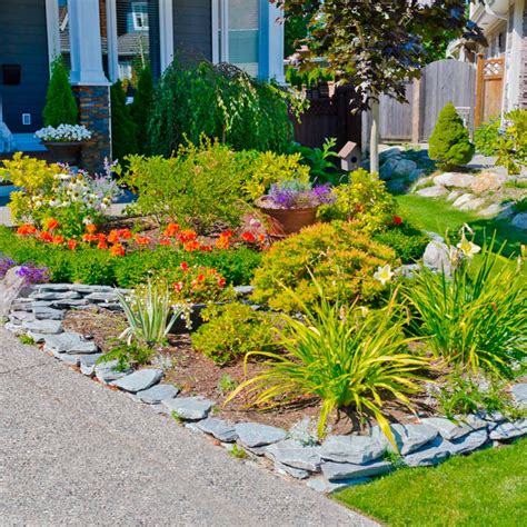 | edging flower beds can be your choice to make your garden more chic than ever. 5 Favorite Flower Bed Edging Ideas | Log planter, Flower ...