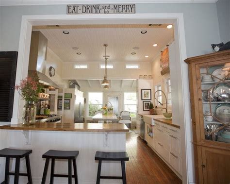 Adding a kitchen pass through can open up closed off spaces and allow light to flow to between rooms. Love the sign above the kitchen entrance. | Kitchen ...