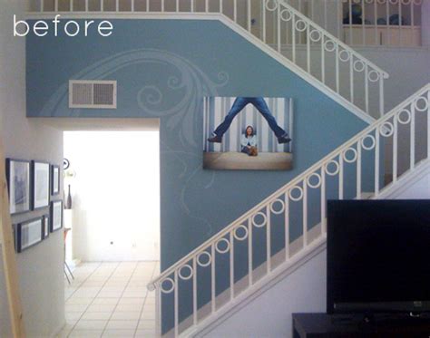 It doesn't even look like wood paneling anymore. before & after: paneled wood wall - Design*Sponge