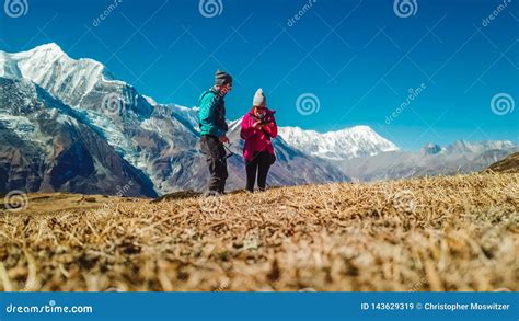 nepal couple and the view on annapurna chainnepal editorial stock image image of love