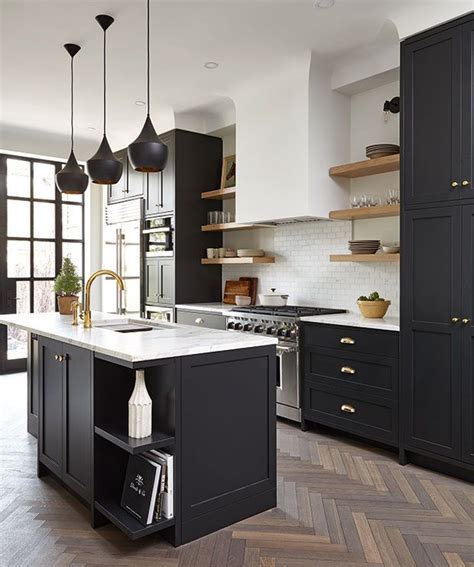 Dark kitchen cabinets with light countertops are always a popular choice this allows you to have a dark kitchen but dark kitchens can take to extremely modern kitchens. 20 Dark & Moody Kitchens That Are Totally Dreamy | Kitchen ...