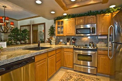 If you haven't yet located an interest in anything some of the most accumulated things that fit with a kitchen décor are colanders, bottles, cookie jars, clocks, and silverware. kitchen oak cabinets for kitchen renovation | Oak kitchen ...