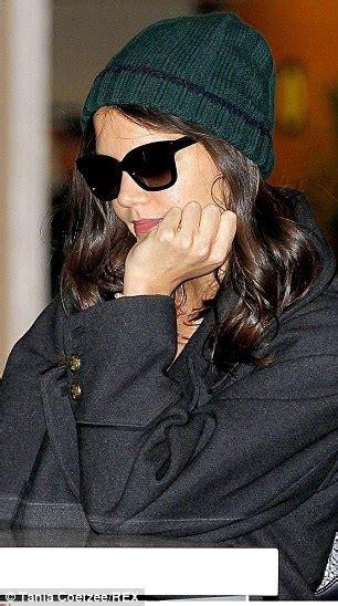 Wrapped Katie Holmes Layers Up In A Beanie Hat And Boots As She Flies