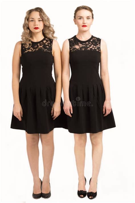 Two Same Women Wearing Evening Dress In Studio Stock Photo Image Of