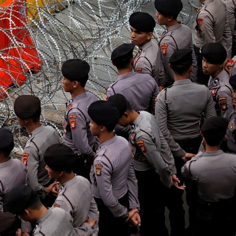 indonesian police officer claims he was fired for being gay files lawsuit for wrongful