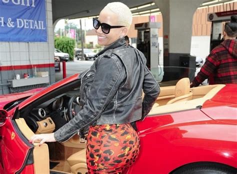 The 32year old mother of one, showcased her hour glass figure in a waist trainer as she arrived a gym in her pink customized ferrari. Amber Rose Seen Driving a Ferrari California, Has Flat Tire - autoevolution