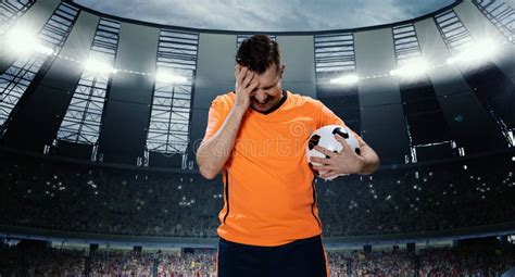 Loosing Game Man Professional Football Player In Orange Uniform