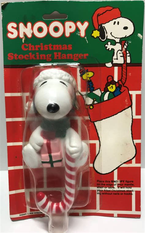 Tas011315 1958 The Peanuts Snoopy Christmas Stocking Hanger Christmas Stocking Hangers