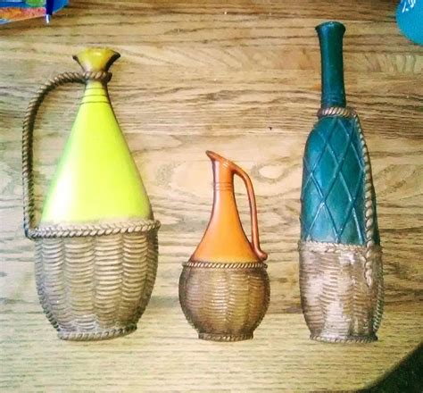 beautiful vintage mid century sexton 3pc metal wall art three bottles with hanging loops on