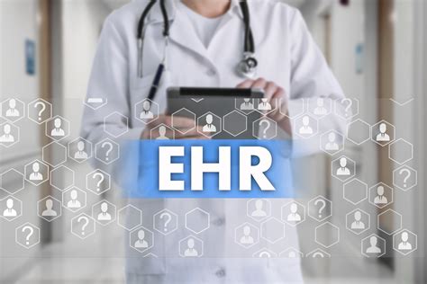 electronic health record ehr on the touch screen with medicine icons on the background blur