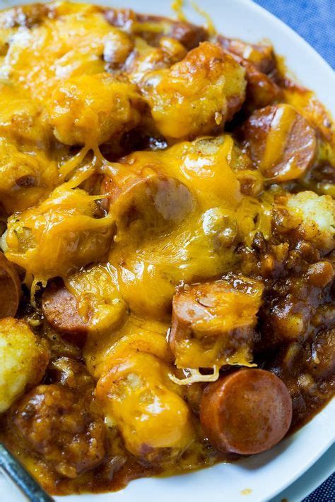 Step 2 meanwhile, slice hot dogs into 1/2 coins. Cheesy Hot Dog Tater Tot Casserole - Spicy Southern ...