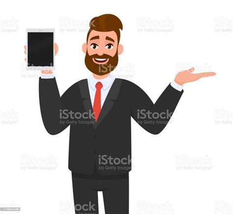 Happy Young Business Man Showingholding Blank Screen Of Tablet Computer