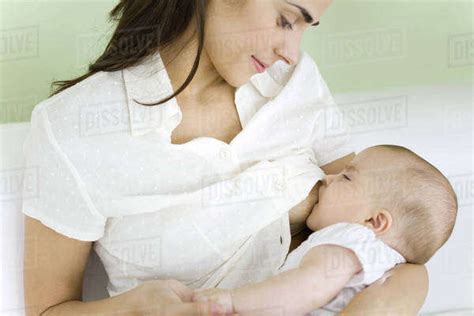 Mother Breastfeeding Baby Close Up Stock Photo Dissolve