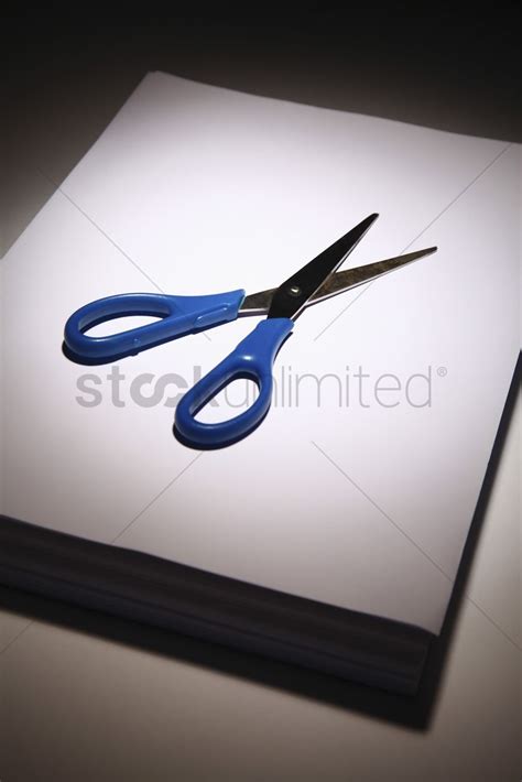 Scissors On A Stack Of Papers Stock Photo 1864169 Stockunlimited